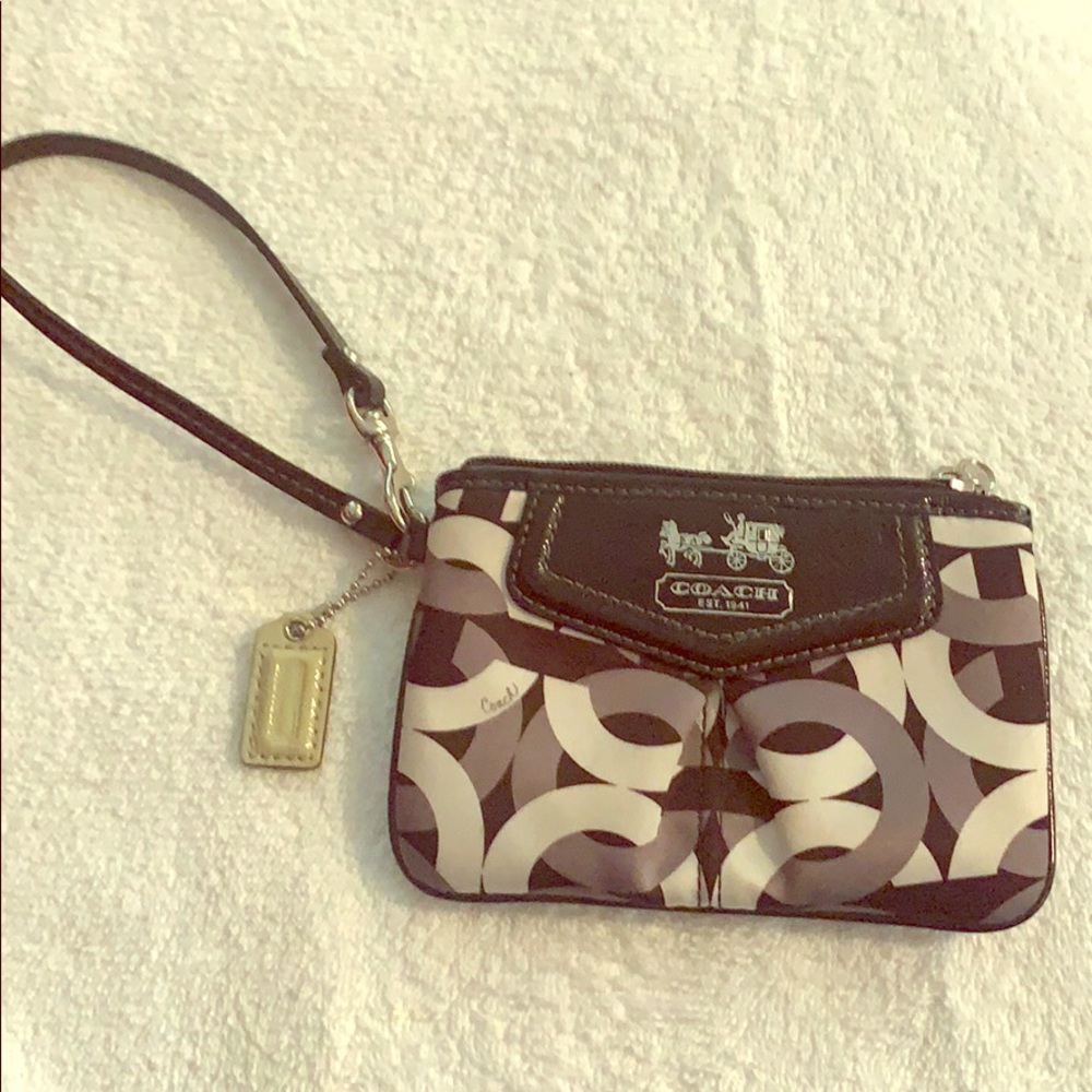 Adorable Coach wristlet! Never worn. Like new! Price drop!